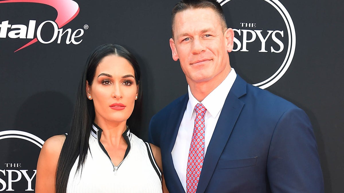 July 12, 2017; Los Angeles, CA, USA; WWE wrestler John Cena with Nikki Bella arrive for the 2017 ESPYS at Microsoft Theater. Mandatory Credit: Jayne Kamin-Oncea-USA TODAY Sports - 10156720