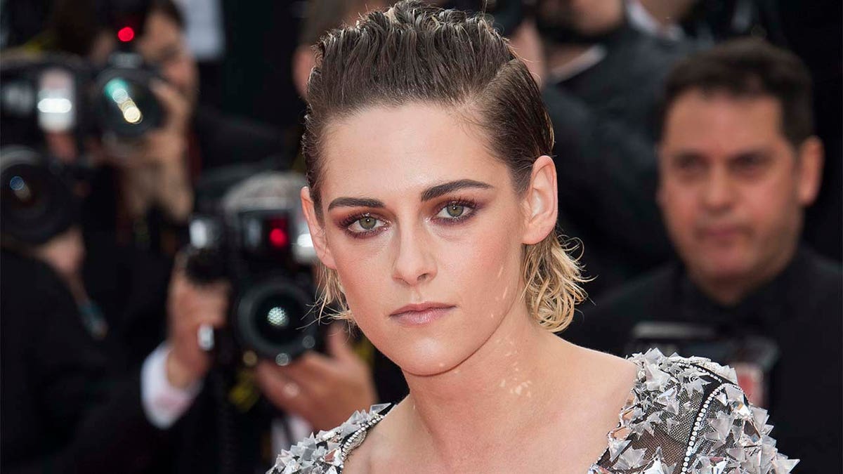 FILE - In this May 14, 2018 file photo, Kristen Stewart poses for photographers at the premiere of the film "BlacKkKlansman" at the 71st international film festival, Cannes, southern France. Stewart is set to star in Elizabeth Banksâ reboot of âCharlieâs Angels.â Sony Pictures on Thursday says Stewartâs fellow Angels will be played by Naomi Scott and Ella Balinska. (Photo by Arthur Mola/Invision/AP, File)