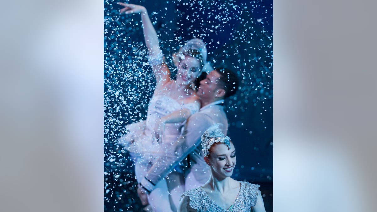 Soloist Abigail Morwood performs during the Cincinnati Ballet's dress rehearsal of the Nutcracker at the Aronoff Center, Thursday, Dec. 17, 2015, in Cincinnati. (AP Photo/John Minchillo)