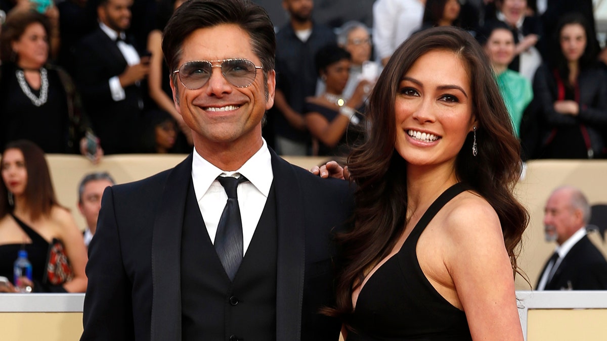 Caitlin McHugh john stamos reuters