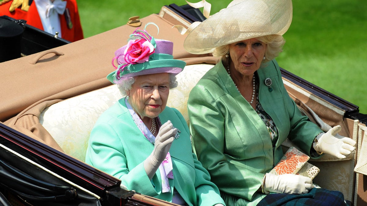 Horse Racing - Royal Ascot - Ascot Racecourse - 19/6/13 
HRH Queen Elizabeth II (L) and Camilla, Duchess of Cornwall arrive for the second day of Royal Ascot 
Mandatory Credit: Action Images / Henry Browne 
Livepic - MT1ACI10985964