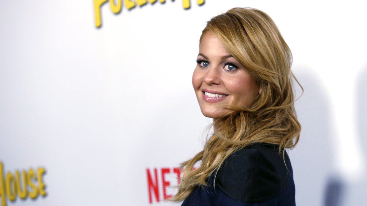 Cast member Candace Cameron Bure poses at the premiere for the Netflix television series 