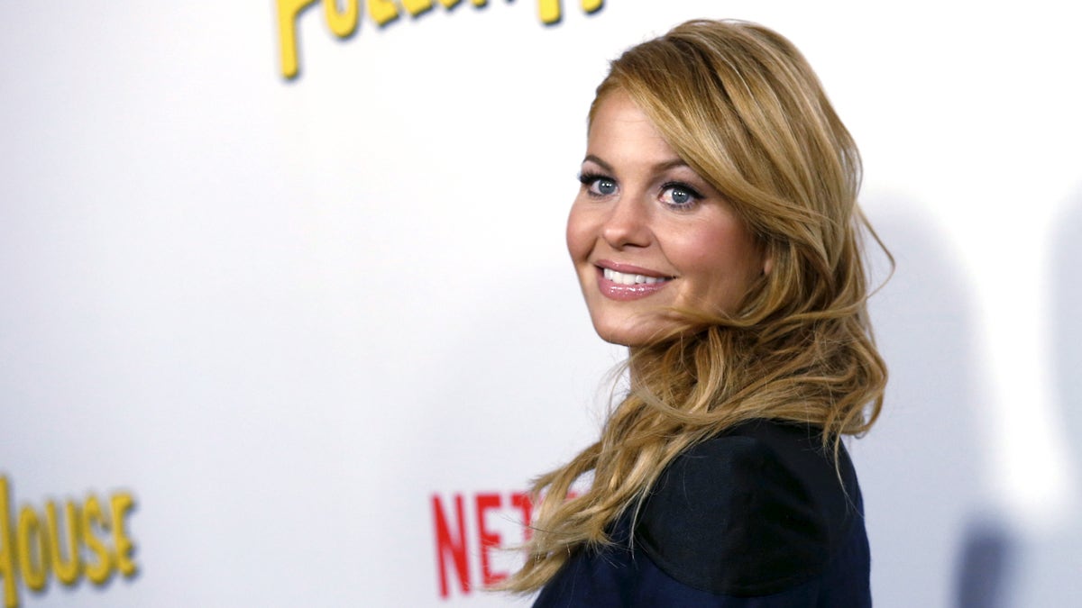 Cast member Candace Cameron Bure poses at the premiere for the Netflix television series 