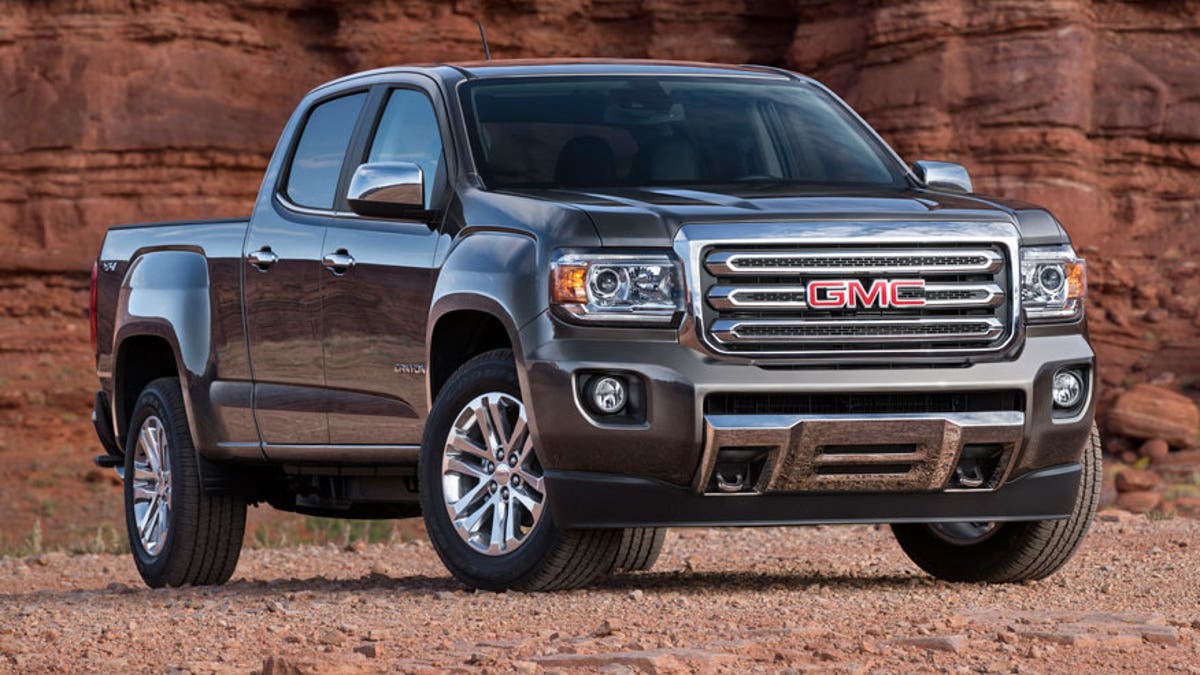 aef183bf-2015 GMC Canyon SLT Crew Cab Long Bed Front Three Quarter in Bronze Alloy Metallic
