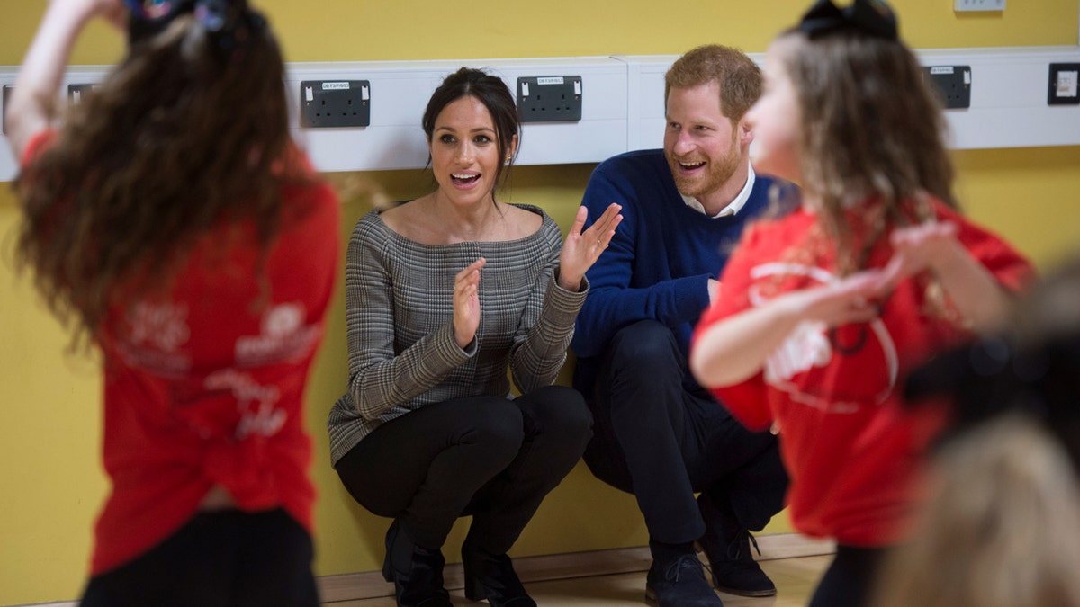 Britain's Prince Harry and his fiancee Meghan Markle attend a street dance class during their visit to Star Hub, a community and leisure centre, in Cardiff, Britain, January 18, 2018. REUTERS/Geoff Pugh/Pool - RC1C9647DFC0