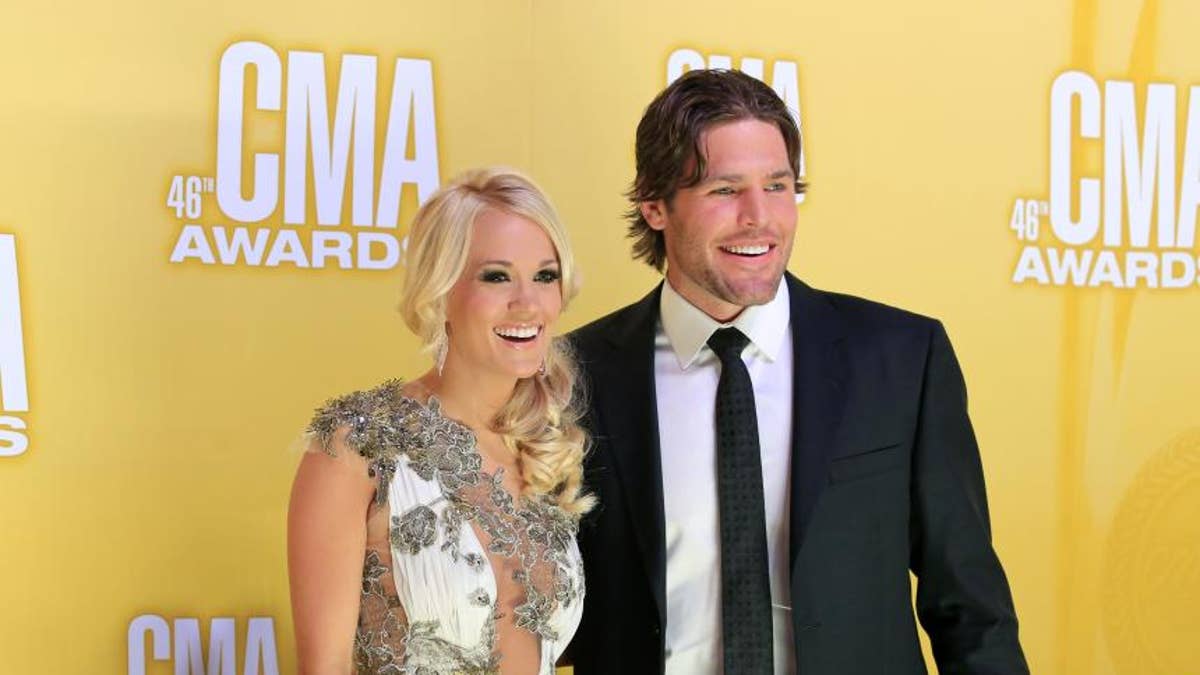 90fe04b3-Carrie Underwood and Mike Fisher