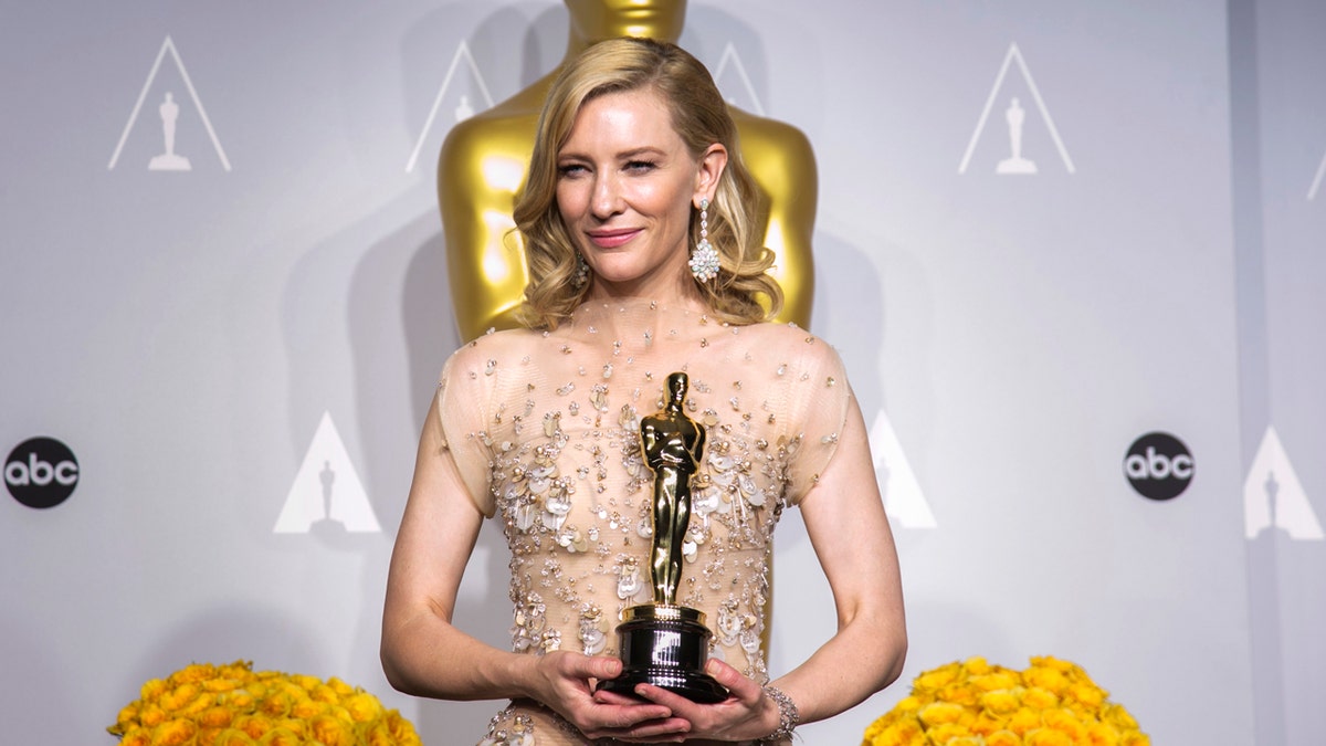 Cate Blanchett holds her Oscar for Best Actress for the film 