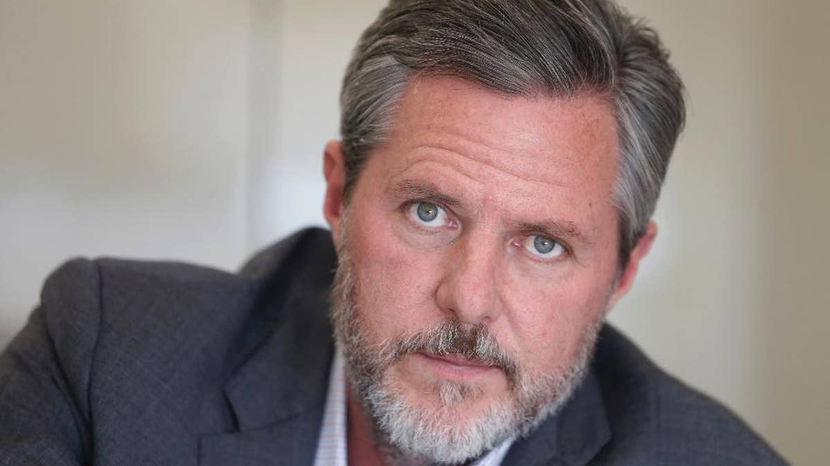 In this Wednesday, Nov. 16, 2016 photo, Liberty University president Jerry Falwell Jr., poses during an interview in his offices at the school in Lynchburg, Va. Falwell Jr. enthusiastically endorsed Donald Trump in January. As Liberty University grew from a tiny Baptist college into a touchstone institution for evangelicals, it also became a hub of conservative politics, a revolving door of politicians and their surrogates courting young voters. But this year, the campus was in the spotlight for another reason: a rift caused by Trump's candidacy that raised questions about the college president's influence, open discourse, and practicality versus principles in choosing a candidate. (AP Photo/Steve Helber)