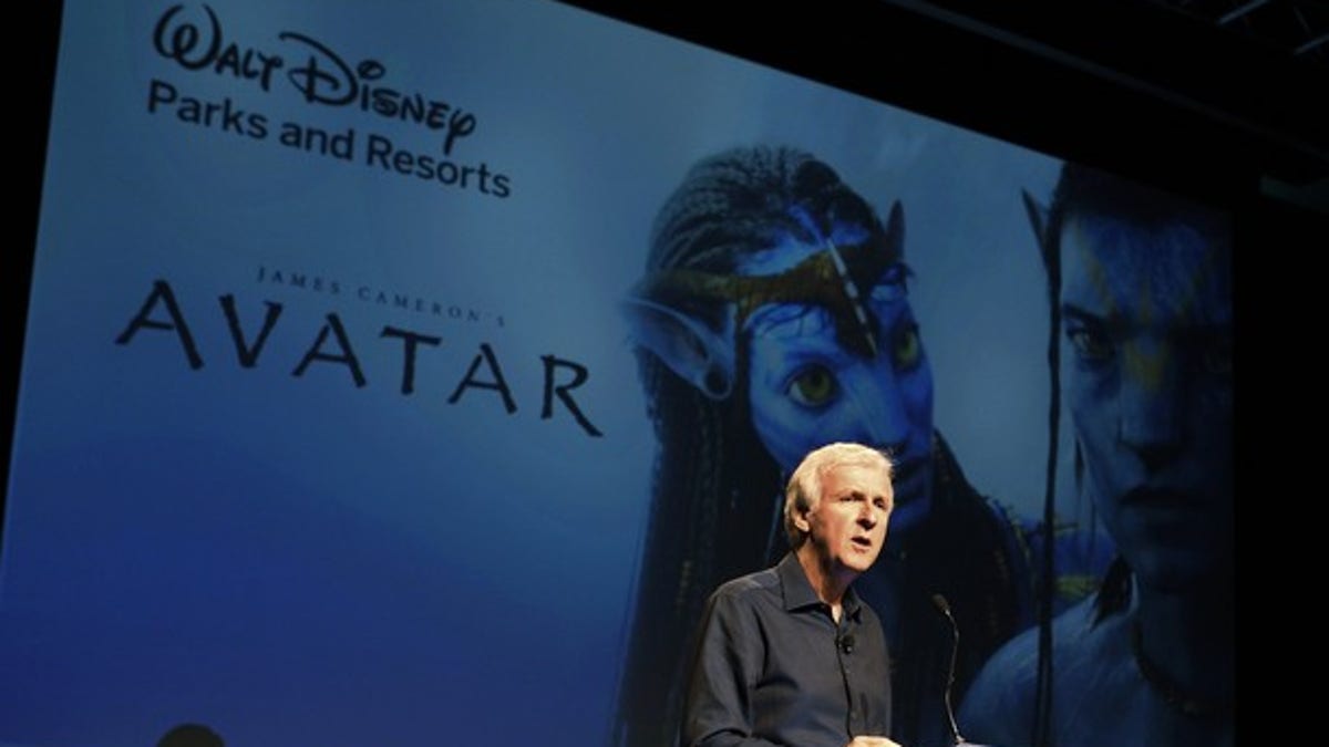 Director James Cameron announce a long-term agreement which will bring &quot;Avatar&quot; themed lands to Disney parks with the the first at Walt Disney World in Orlando, Florida, as he speaks at a media briefing in Glendale, Calfornia September 20, 2011. A scene from &quot;Avatar&quot; is shown on screen background. REUTERS/Fred Prouser (UNITED STATES - Tags: ENTERTAINMENT BUSINESS)