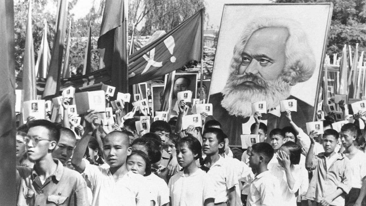 Chinese demonstrators with Karl Marx banner