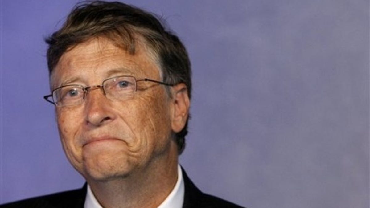 Microsoft founder Bill Gates answers reporters of the Associated Press during the G20 summit in Cannes, Thursday, Nov. 3, 2011. (AP Photo/Remy de la Mauviniere)