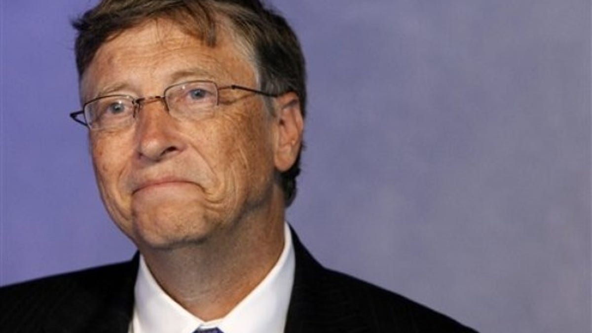 Microsoft founder Bill Gates answers reporters of the Associated Press during the G20 summit in Cannes, Thursday, Nov. 3, 2011. (AP Photo/Remy de la Mauviniere)