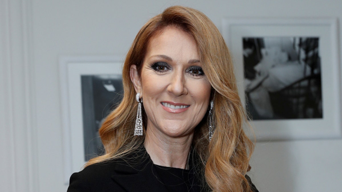 Singer Celine Dion poses before attending the Dior Haute Couture Fall Winter 2016/2017 fashion show in Paris, France, July 4, 2016. REUTERS/Benoit Tessier - RTX2JNFT