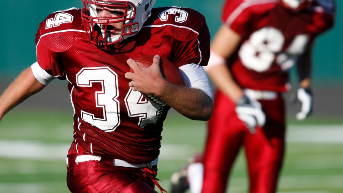 crying football player