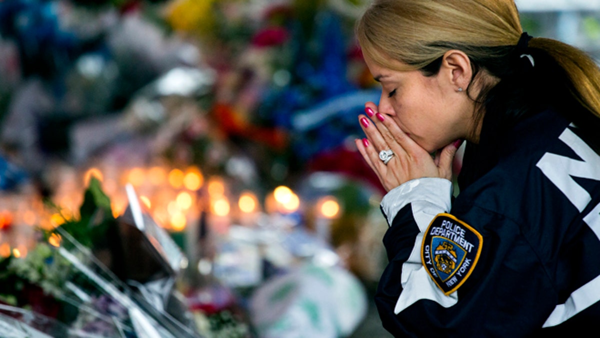 APTOPIX NYPD Officers Slain Developments