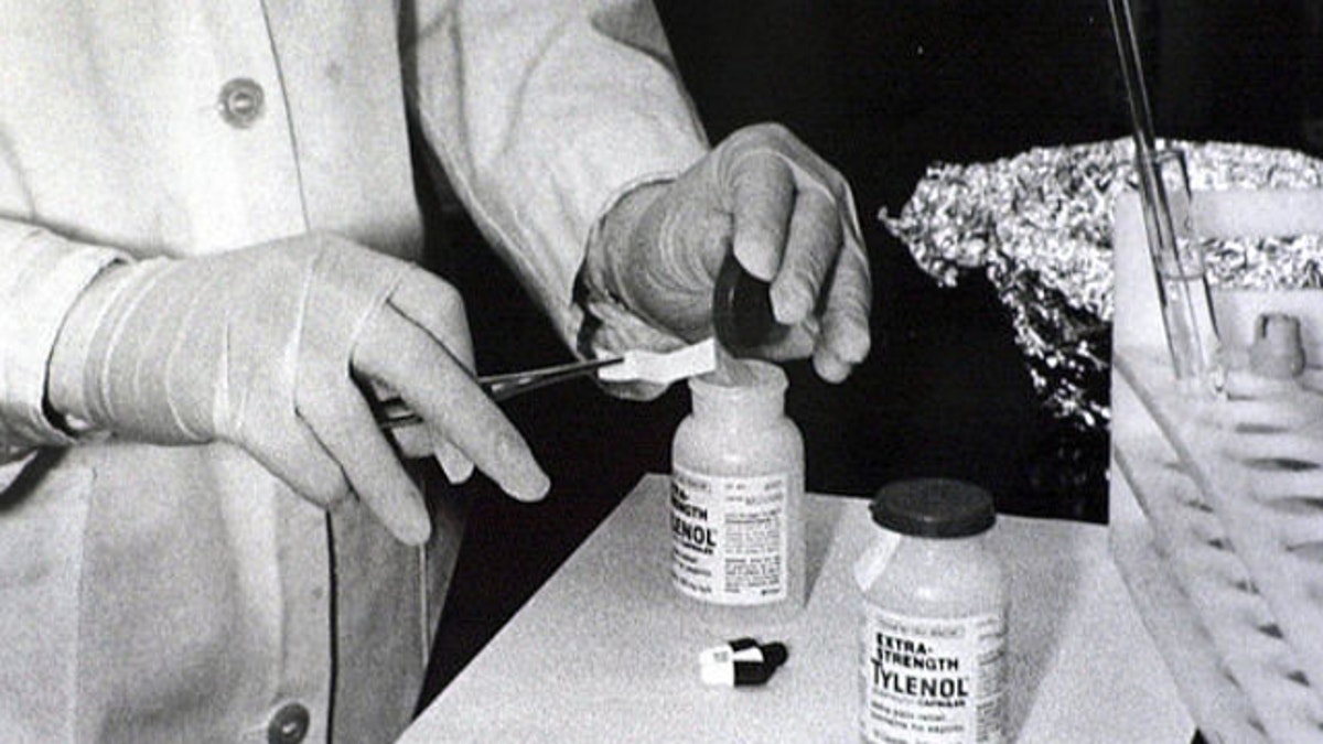 FILE: October 1982: Bottles of Extra-Strength Tylenol are tested with a chemically treated paper that turns blue in the presence of cyanide at the Illinois Department of Health in Chicago. 