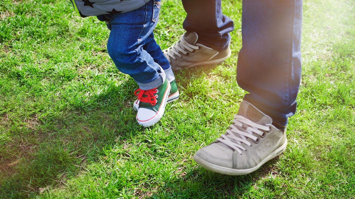 child and dad istock medium