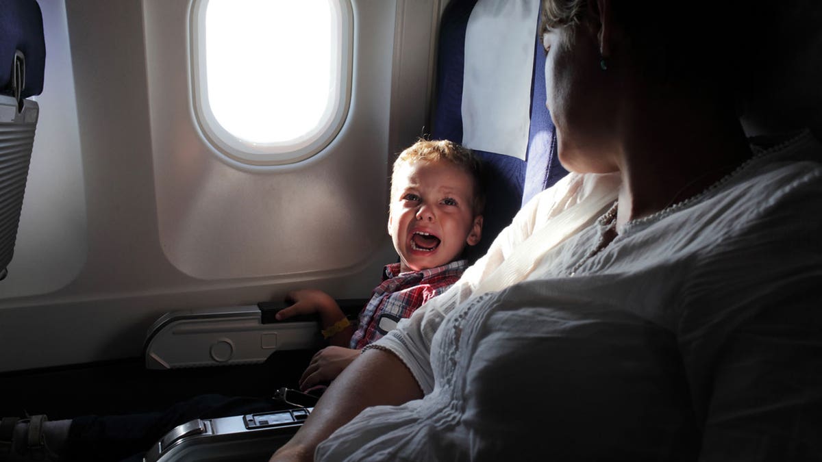 child cries on airplane