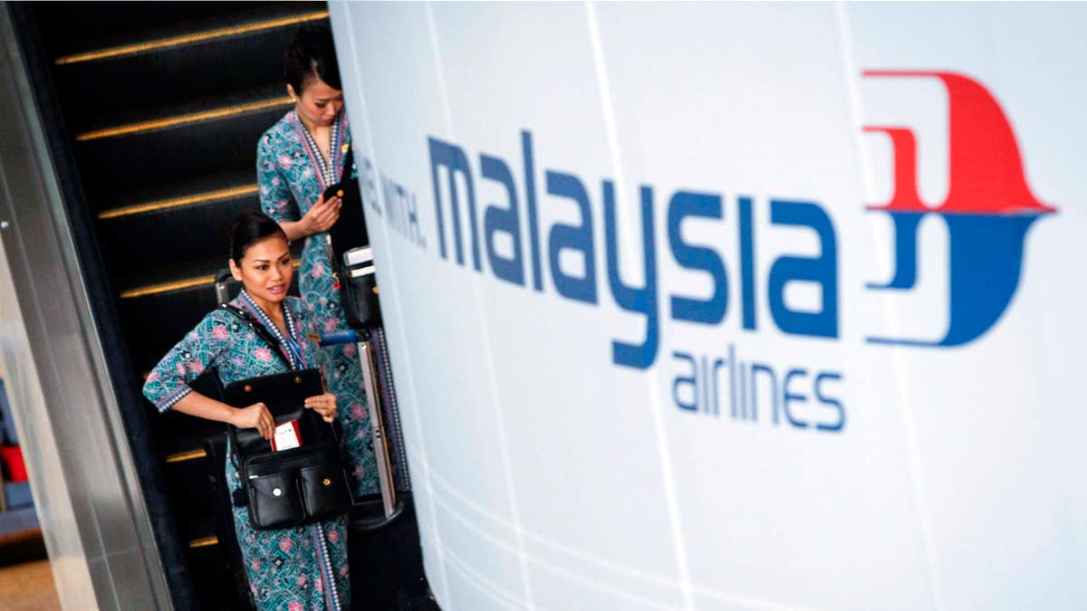 Kerabat penumpang MH370 yang hilang di Tiongkok yakin mereka masih hidup