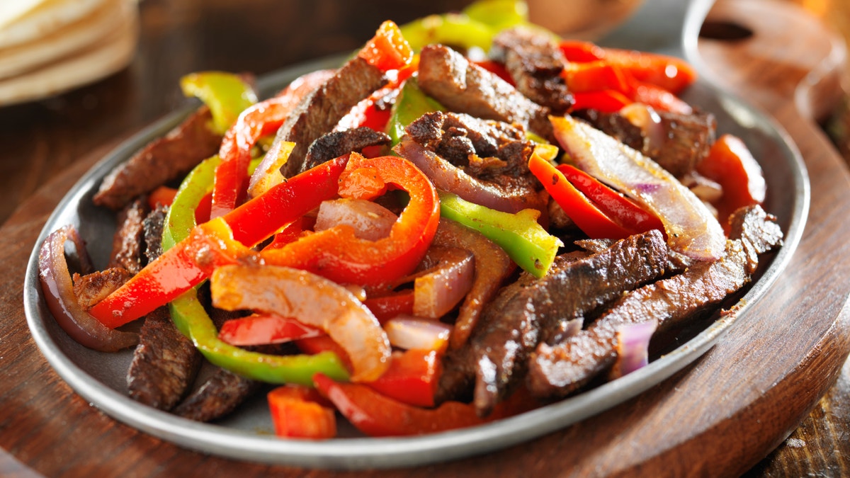 mexican food - beef fajitas and bell peppers