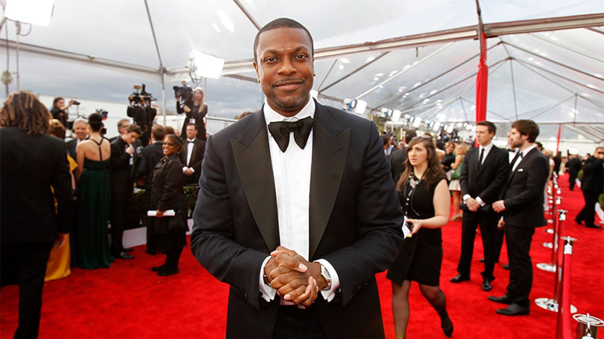 Actor Chris Tucker arrives at the 19th annual Screen Actors Guild Awards in Los Angeles, California January 27, 2013. REUTERS/Mario Anzuoni (UNITED STATES - Tags: ENTERTAINMENT) (SAGAWARDS-ARRIVALS) - TB3E91S01TIIU
