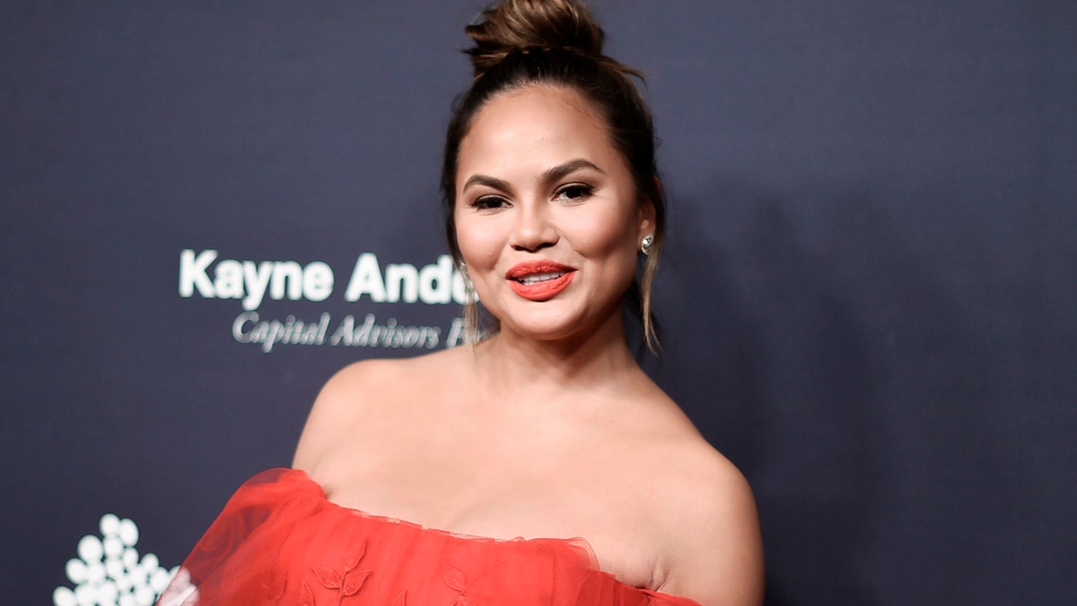 FILE - In this Nov. 11, 2017 file photo, Chrissy Teigen attends the 6th Annual Baby2Baby Gala honoring Gwyneth Paltrow in Culver City, Calif. Teigen, famous for her unfiltered comments on social media, spoke to the Associated Press, Friday, March 30, 2018, to promote her creative consultant role with Pampers, and her singer husband John Legend's upcoming live performance in "Jesus Christ Superstar Live" on NBC. (Photo by Richard Shotwell/Invision/AP, File)