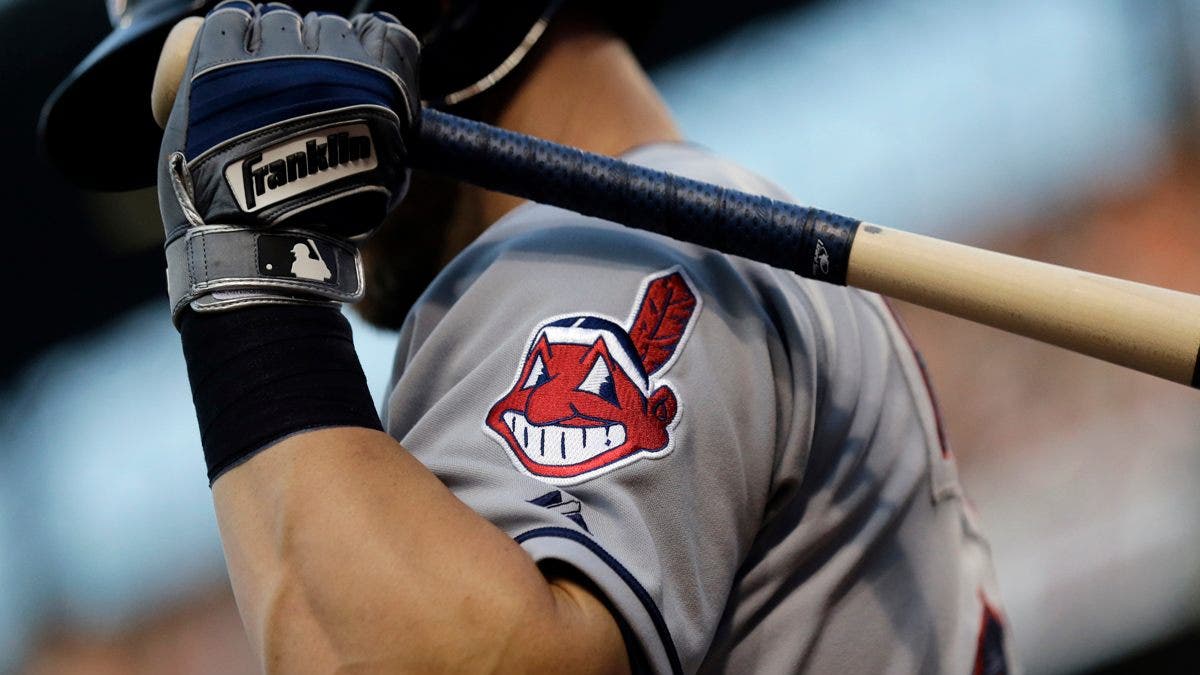 FILE - This June 26, 2015, file photo, shows the Cleveland Indians logo on a jersey during a baseball game against the Baltimore Orioles in Baltimore.  Indians are taking the divisive Chief Wahoo logo off their uniforms and caps, starting in 2019. (AP Photo/Patrick Semansky, File)