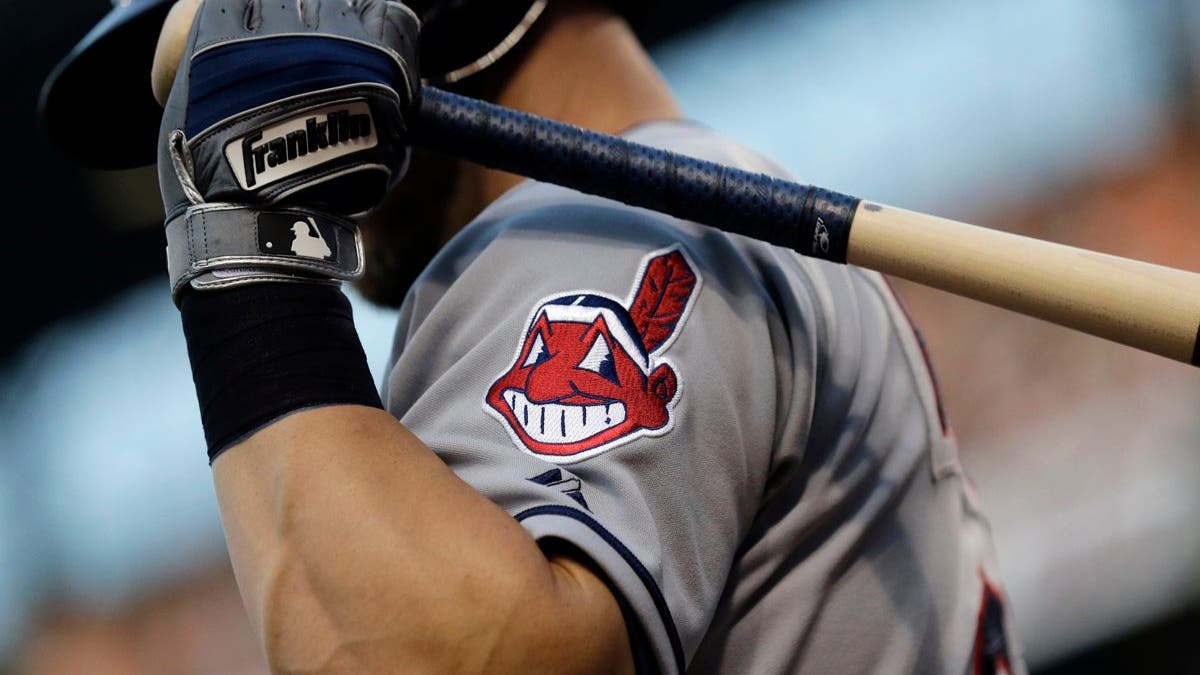 FILE - This June 26, 2015, file photo, shows the Cleveland Indians logo on a jersey during a baseball game against the Baltimore Orioles in Baltimore.  Indians are taking the divisive Chief Wahoo logo off their uniforms and caps, starting in 2019. (AP Photo/Patrick Semansky, File)