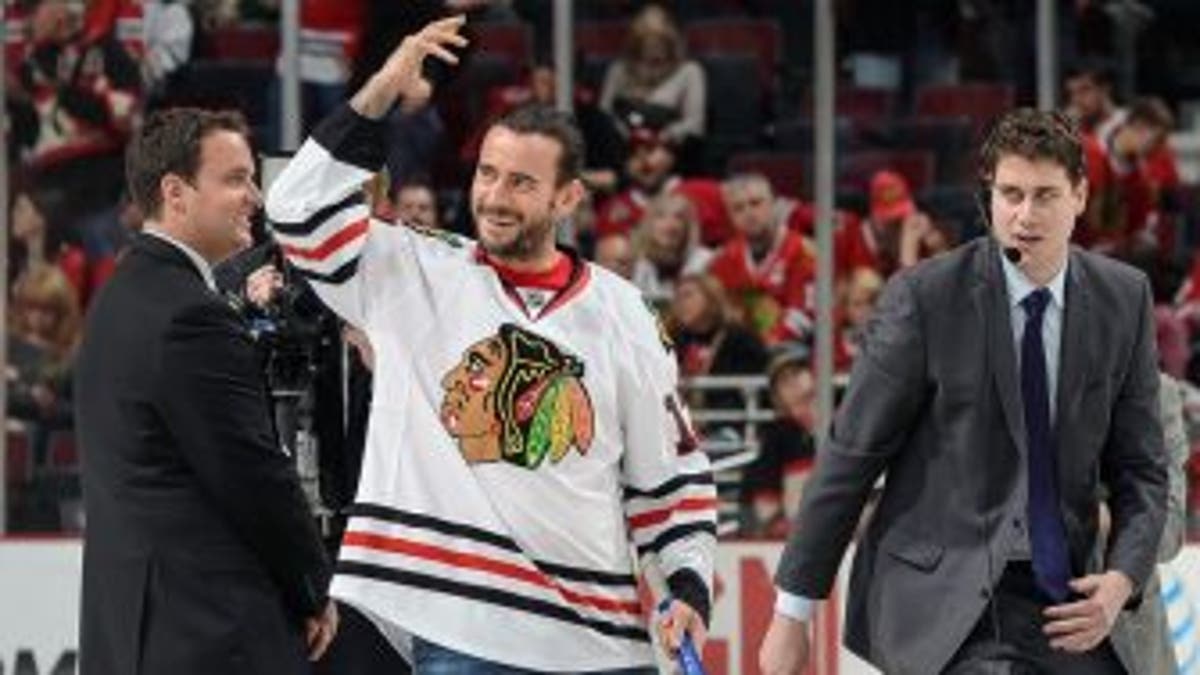 CM Punk pays off bet with L.A. Kings' mascot, posts sad picture