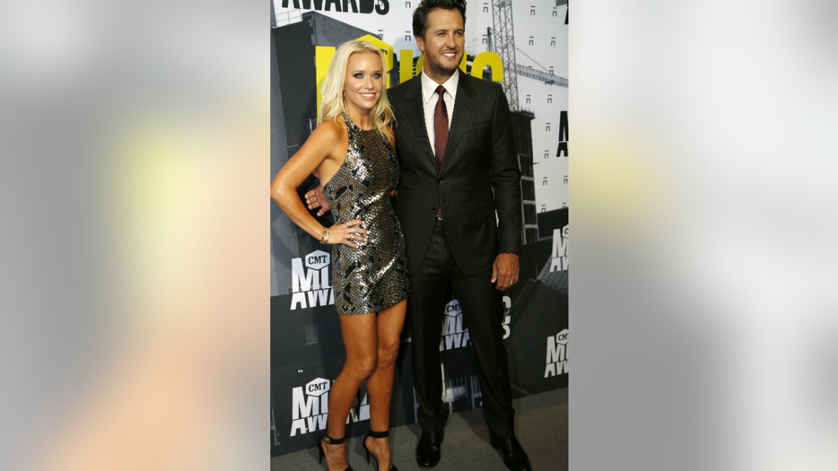 Luke Bryan and his wife Caroline are raising their two sons, nephew, and two nieces. 