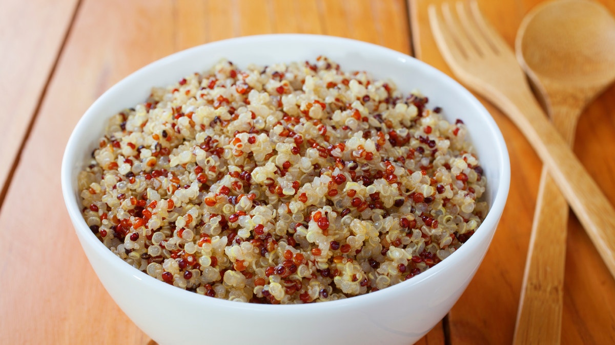 Quinoa and Amaranth - a bowl of cooked quinoa and amaranth. Contains red, white and black quinoa.