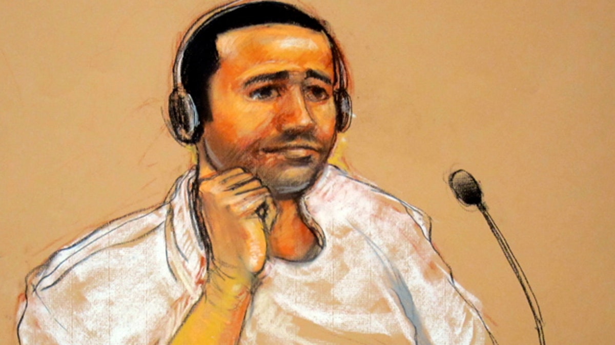 Nov. 9: In this sketch by courtroom artist Janet Hamlin, reviewed by the U.S. military, Abd al-Rahim al-Nashiri is seen during his military commissions arraignment at the Guantanamo Bay.