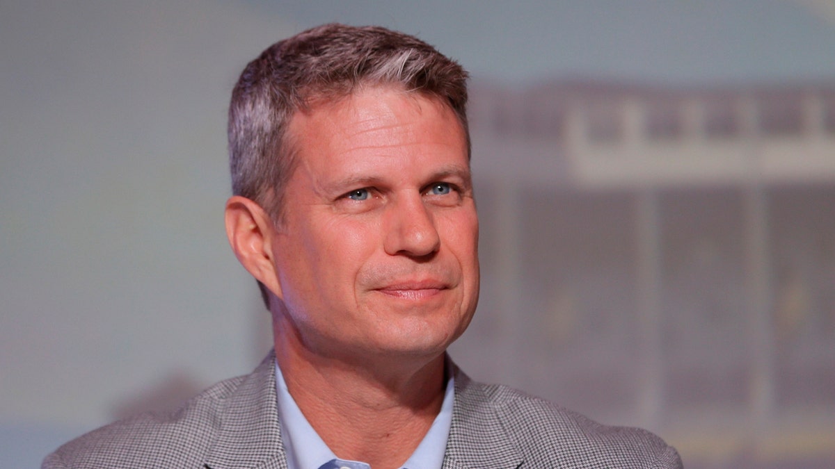 FILE - In this Sept. 19, 2015, file photo, Rep. Bill Huizenga, R-Mich., is seen during a congressional panel at the 2016 Mackinac Republican Leadership Conference in Mackinac Island, Mich. Huizenga cited a decision to delay treatment of his son's broken arm as an example of the kind of choices Americans would face if Republicans' repeal of the health care law shifts more out-of-pocket costs to consumers. He told Michigan news site MLive.com that he and his wife opted to place a splint on their son's arm and wait until the next morning to take him to the doctor rather than seek immediate but more costly treatment at an emergency room. (AP Photo/Carlos Osorio, File)