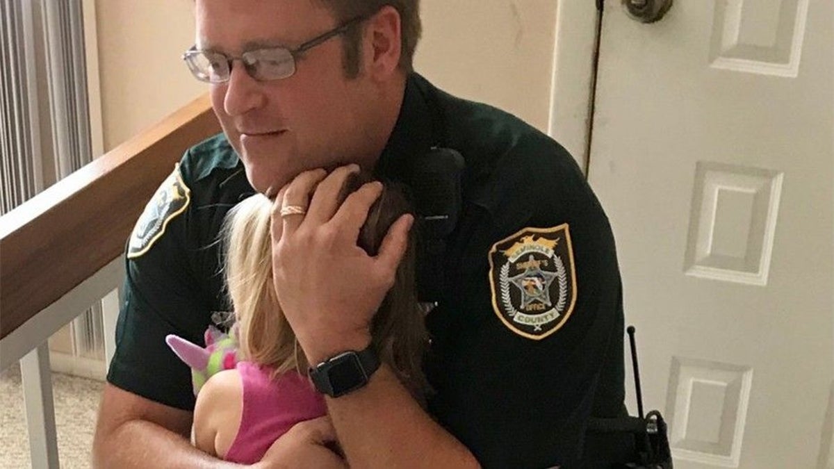 Cop and kid he saved