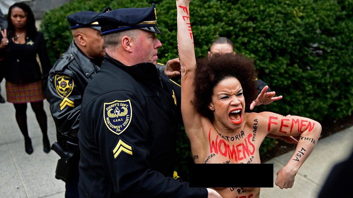 cosby protester black bar ap