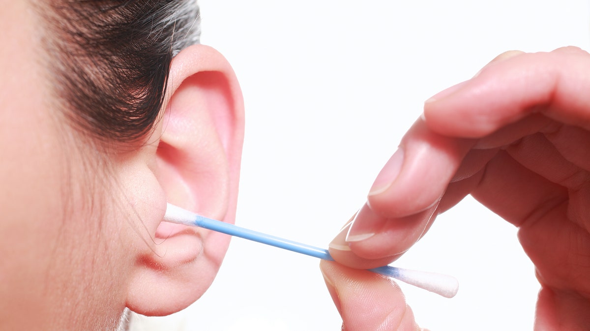 cotton swab in ear cleaning ears istock large