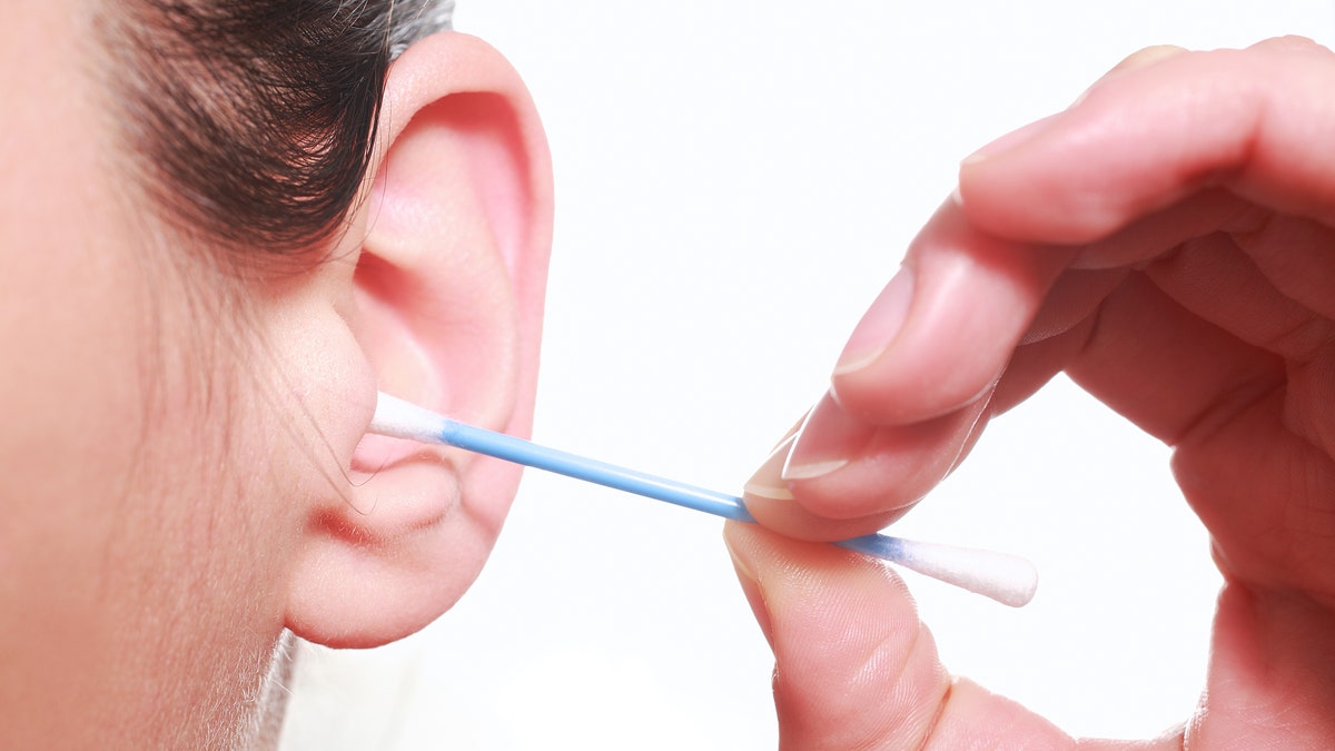 cotton swab in ear cleaning ears istock large