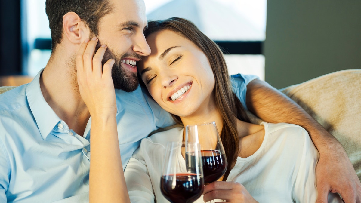 couple drinking red wine istock large