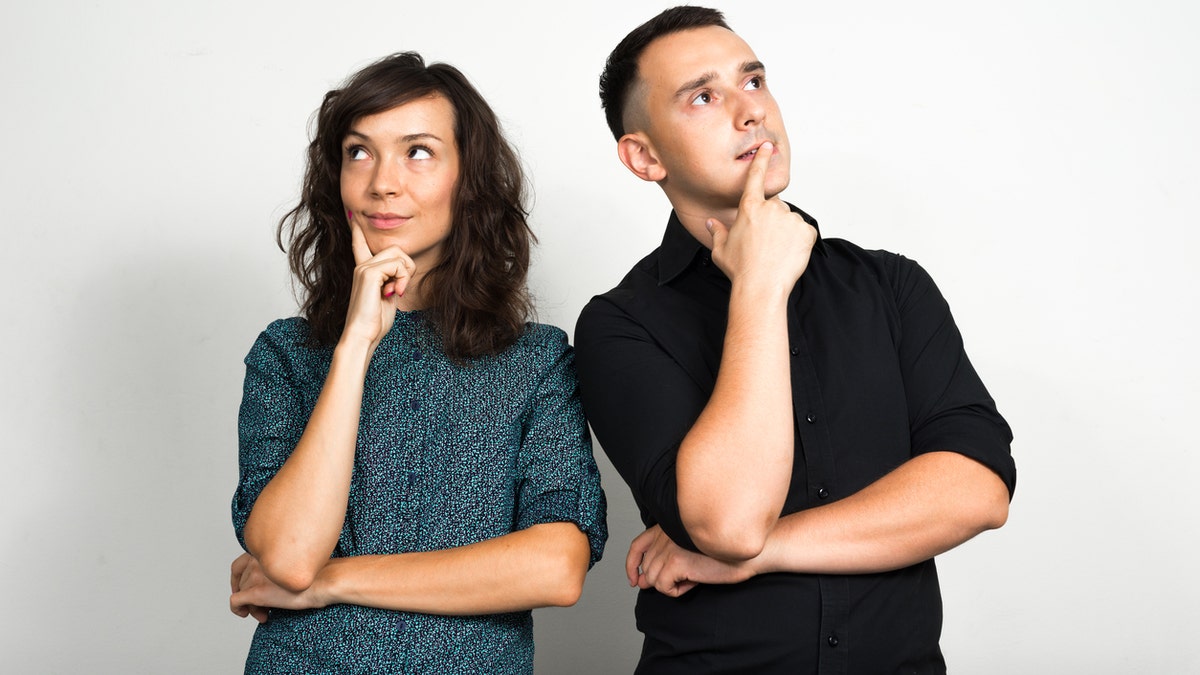 couple thinking istock