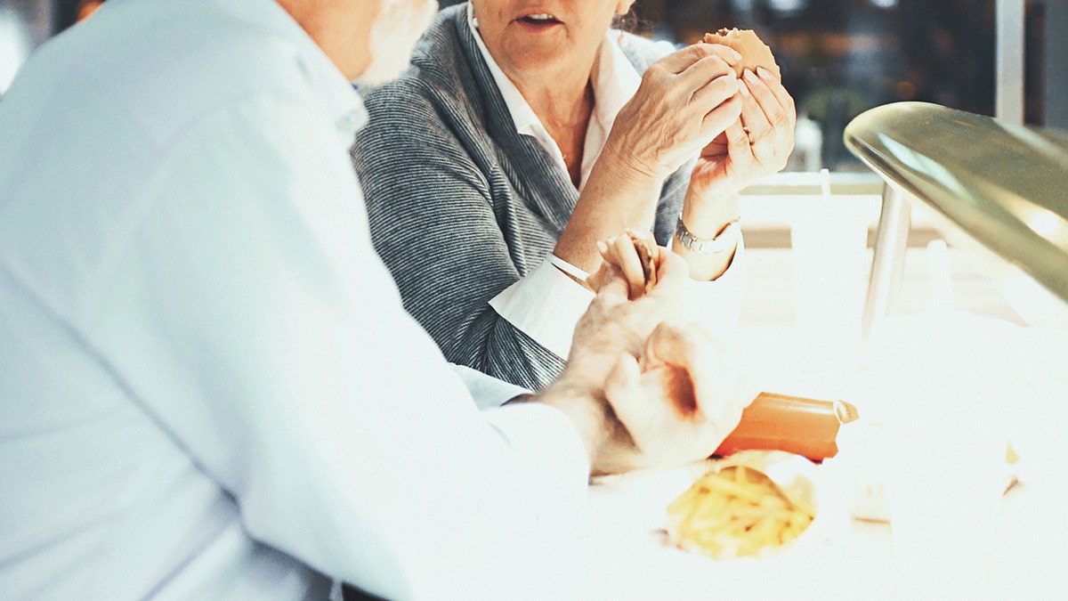 couple fast food istock