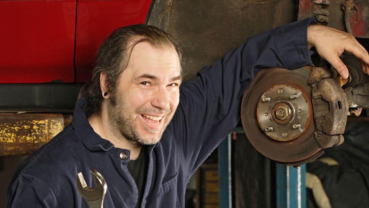 Crazy mechanic fixing the brakes