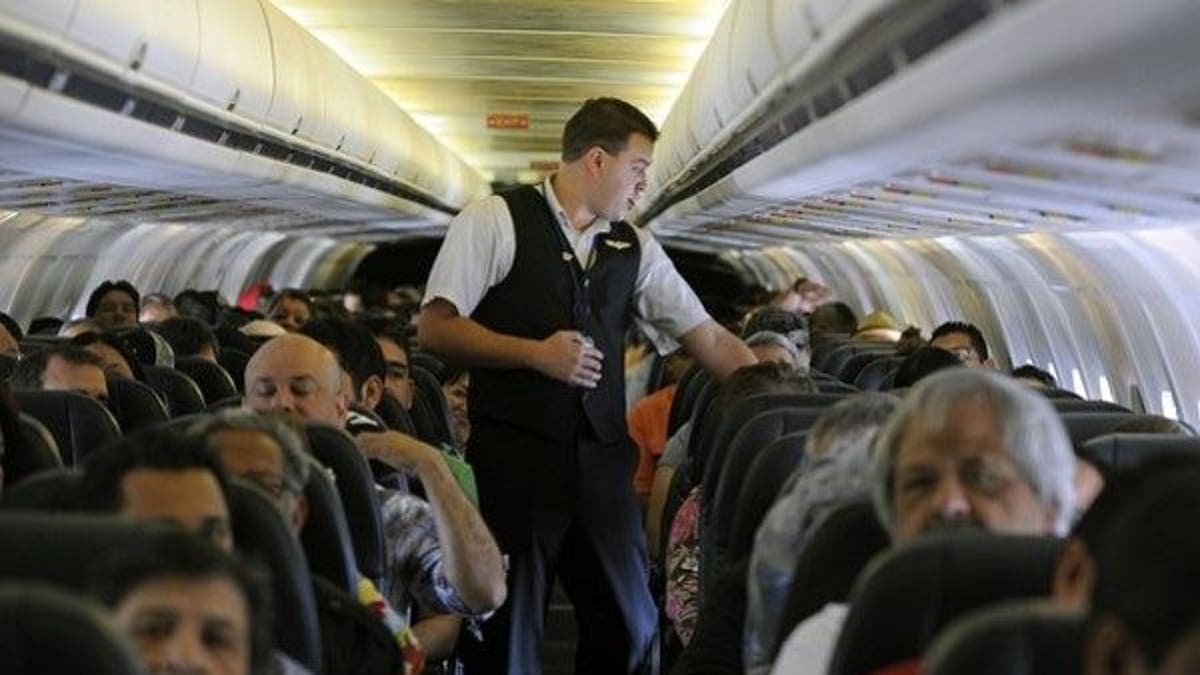 Crowded conditions: Airline carriers pack more passengers on each flight to save money. 