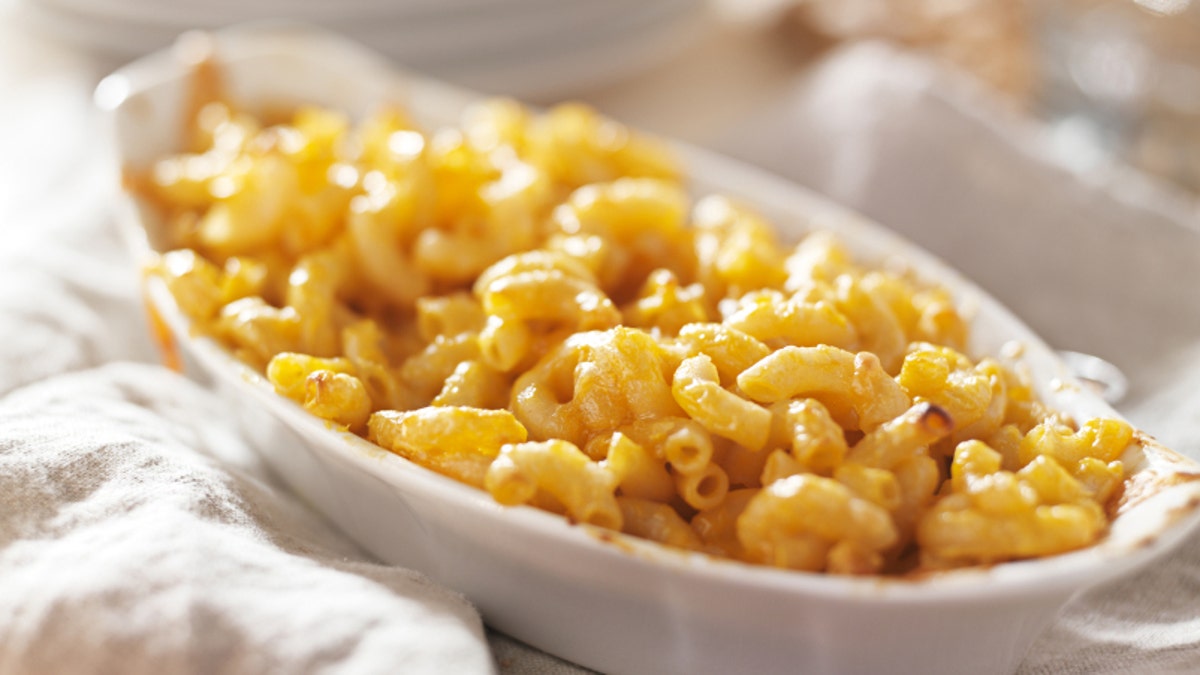 d100a320-bowl of baked macaroni and cheese