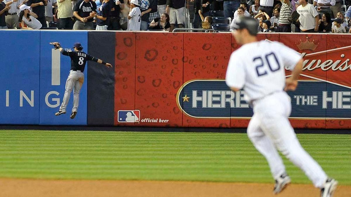 Yankees' Jorge Posada makes emergency return to catching duties