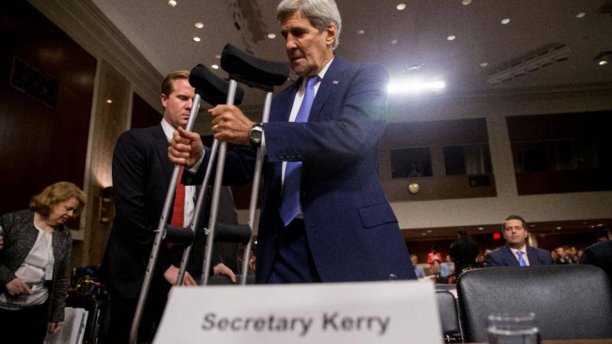 Secretary of State John Kerry arrives on Capitol Hill in Washington, Wednesday, July 29, 2015, to testify before a Senate Armed Services Committee hearing on the impacts of the Joint Comprehensive Plan of Action (JCPOA) on U.S. Interests and the Military Balance in the Middle East. (AP Photo/Andrew Harnik)