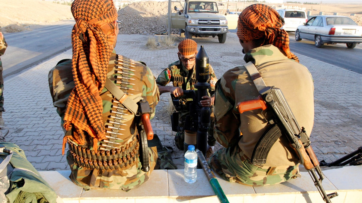 Kurdish Peshmerga fighters gather north of Kirkuk, Iraq October 19, 2017. REUTERS/Ako Rasheed - RC1244BF1E20