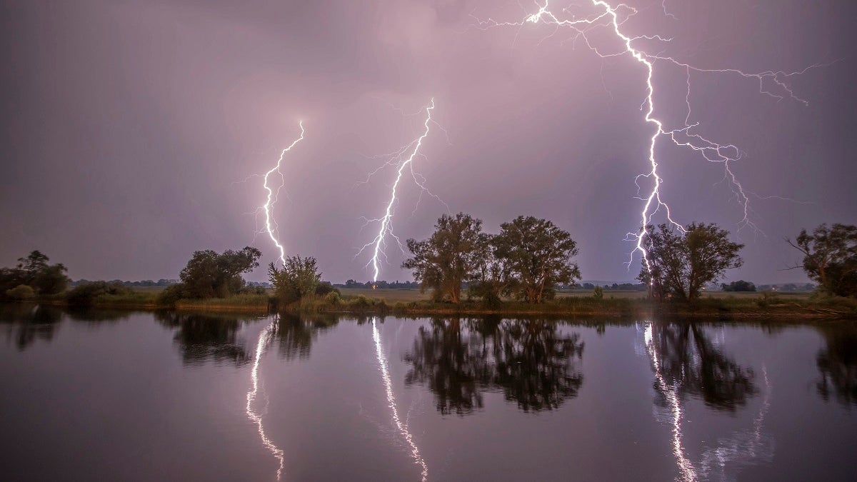 In this May 27, 2018 photo thunderbolts are reflected near Premnitz, eastern Germany. (Julian Staehle/dpa via AP)