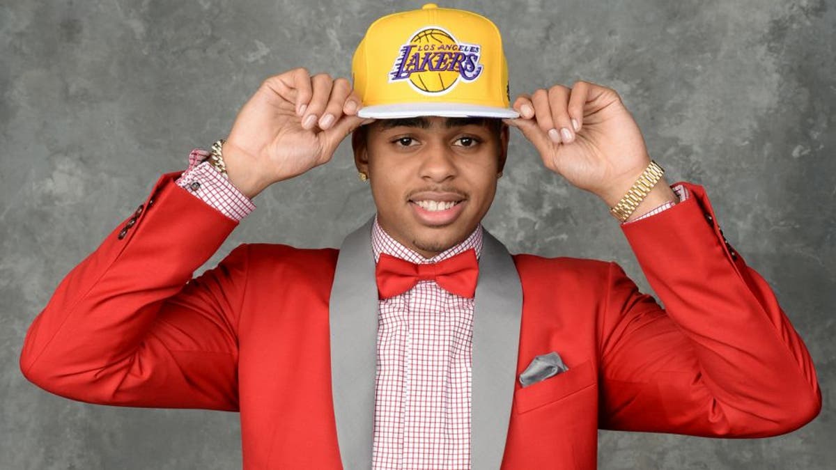 BROOKLYN, NY - JUNE 25: D'Angelo Russell poses for a portrait after being drafted number two overall to the Los Angeles Lakers during the 2015 NBA Draft at the Barclays Center on June 25, 2015 in the Brooklyn borough of New York City. NOTE TO USER: User expressly acknowledges and agrees that, by downloading and/or using this photograph, user is consenting to the terms and conditions of the Getty Images License Agreement. Mandatory Copyright Notice: Copyright 2015 NBAE (Photo by Jennifer Pottheiser/NBAE via Getty Images)