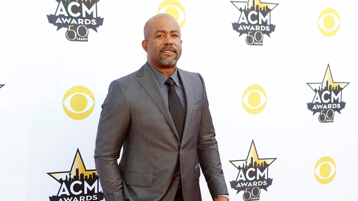 Singer Darius Rucker arrives at the 50th Annual Academy of Country Music Awards in Arlington, Texas April 19, 2015. REUTERS/Mike Stone - RTX19FHV