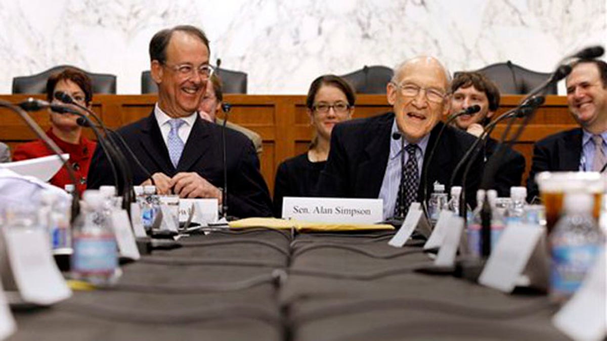 FILE: Debt commission co-chairmen former Wyoming Sen. Alan Simpson, right, and Erskine Bowles took part in a meeting on Capitol Hill in Washington, Wednesday, Dec. 1, 2010, before failing to win a supermajority of the panel making recommendations to Congress.